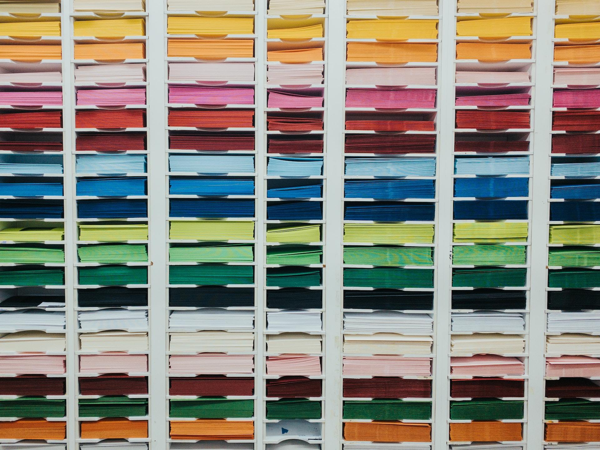 Draws of color-coordinated paper.