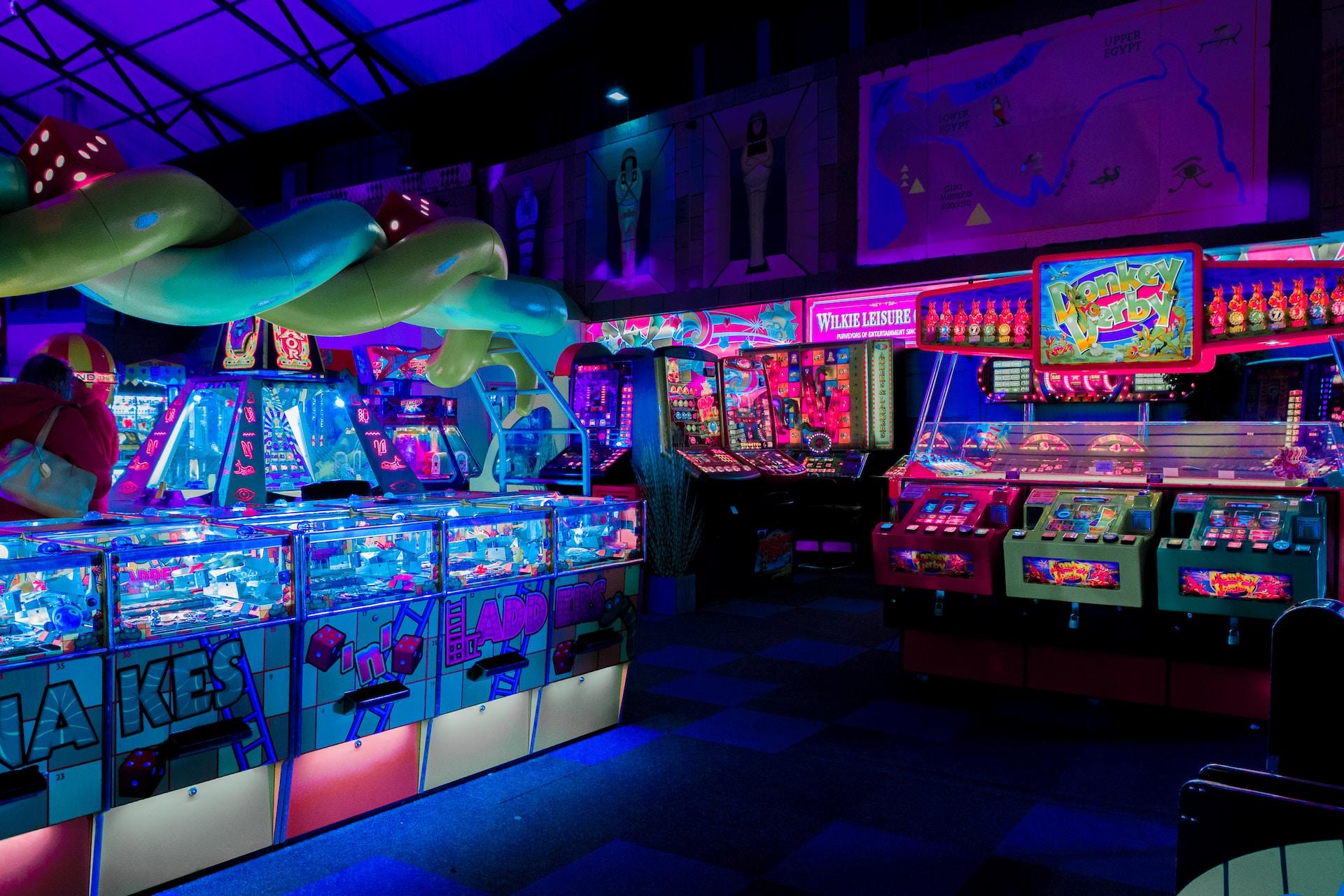 An arcade full of neon lights and games