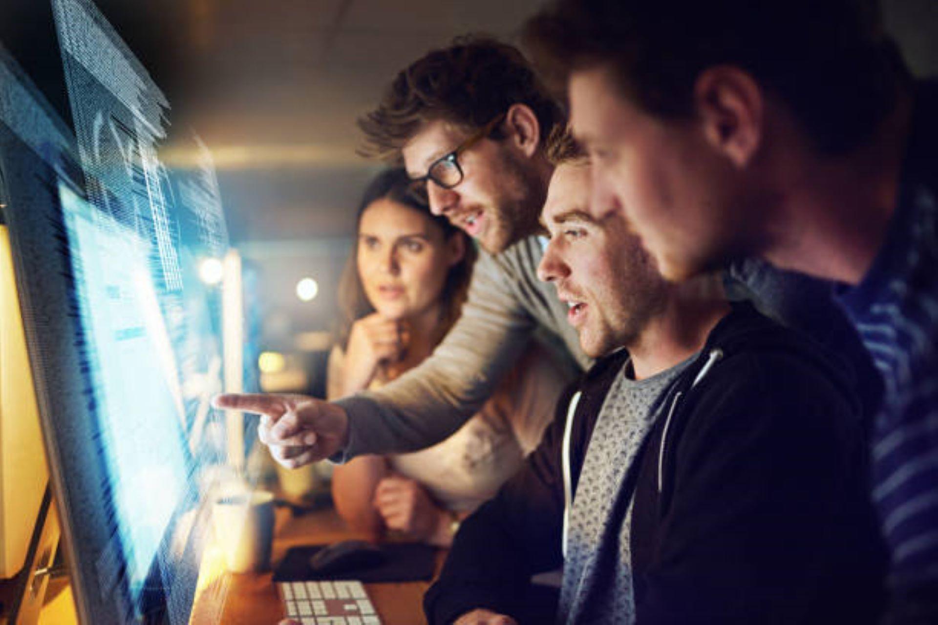 Programmers working on a computer