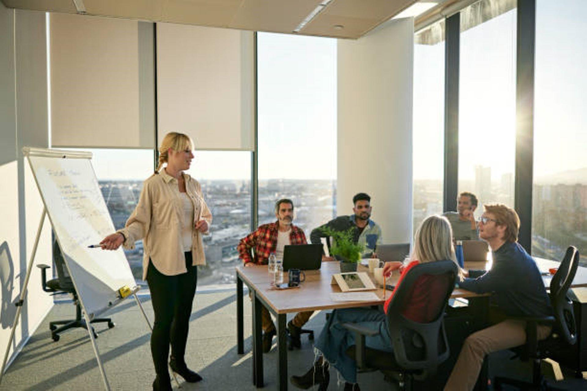 Project manager discussing ideas with other team members.