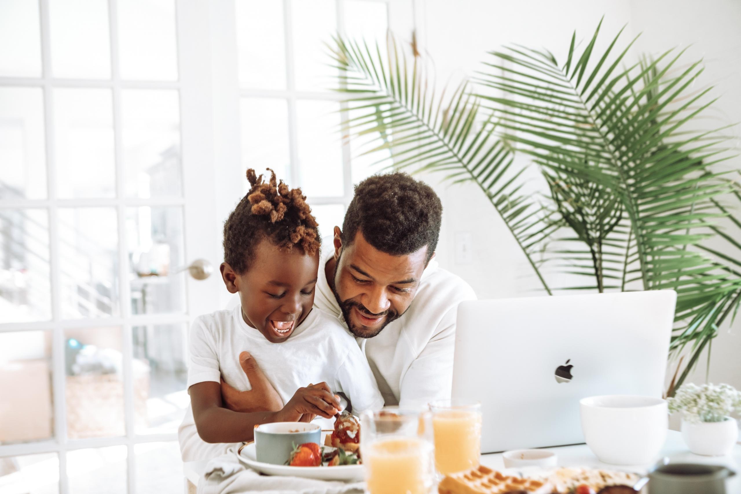 Dad and son laughing