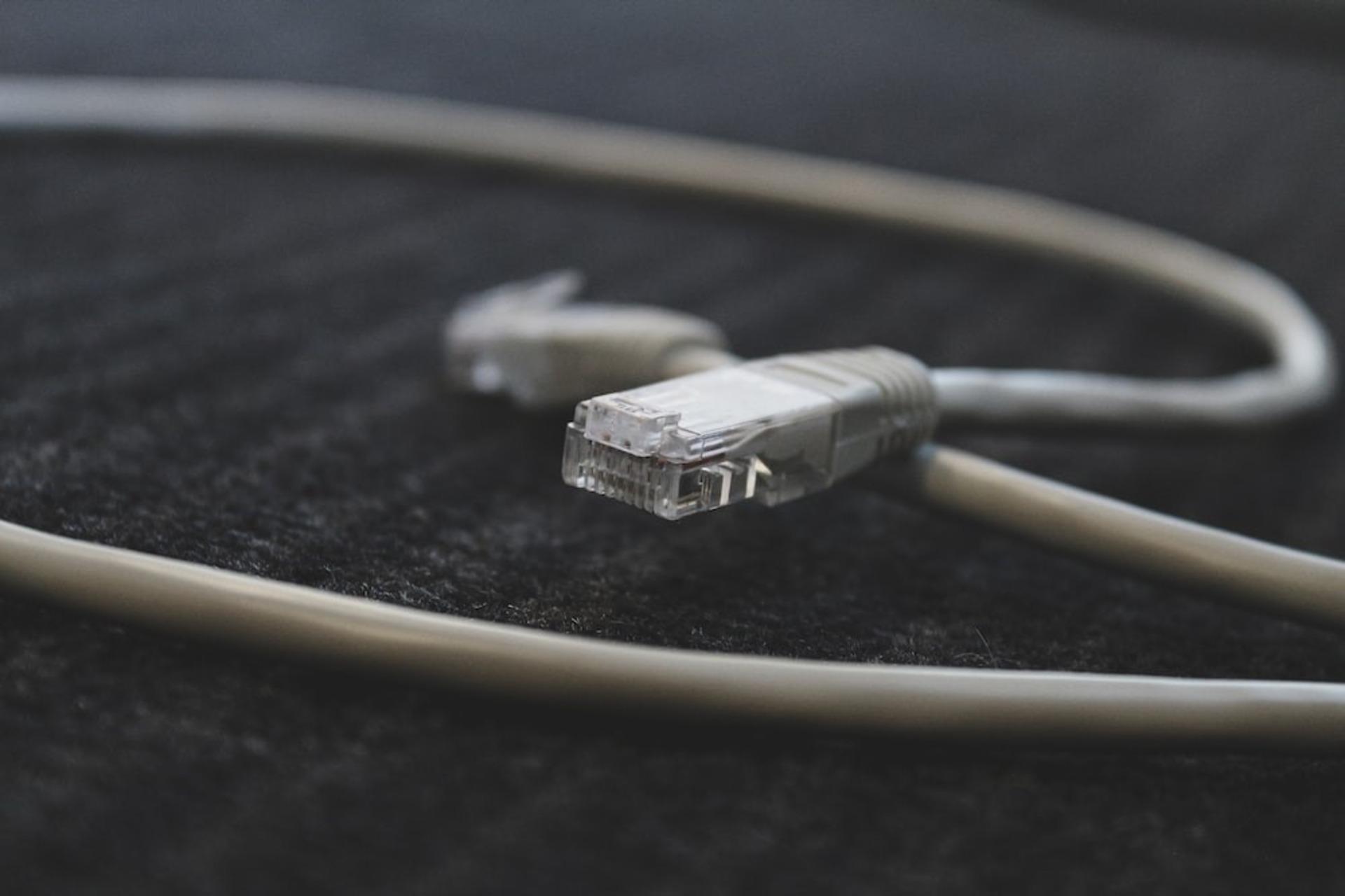 A cable on a black surface.