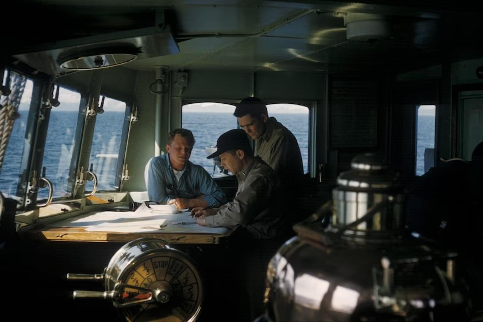 Three marine biologists working on-site