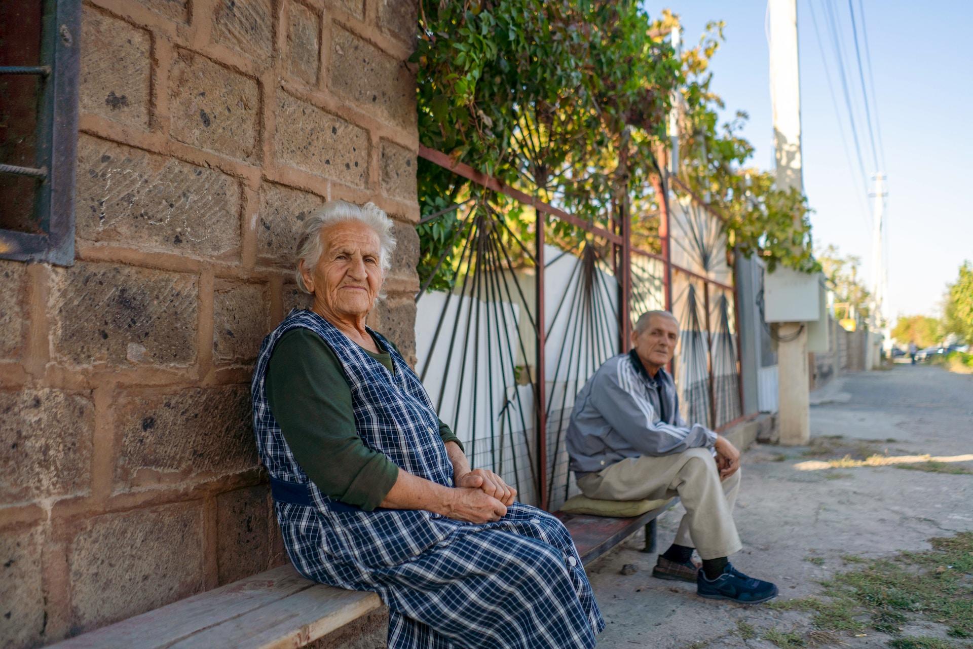 Two Armenians sitting on a bench.
