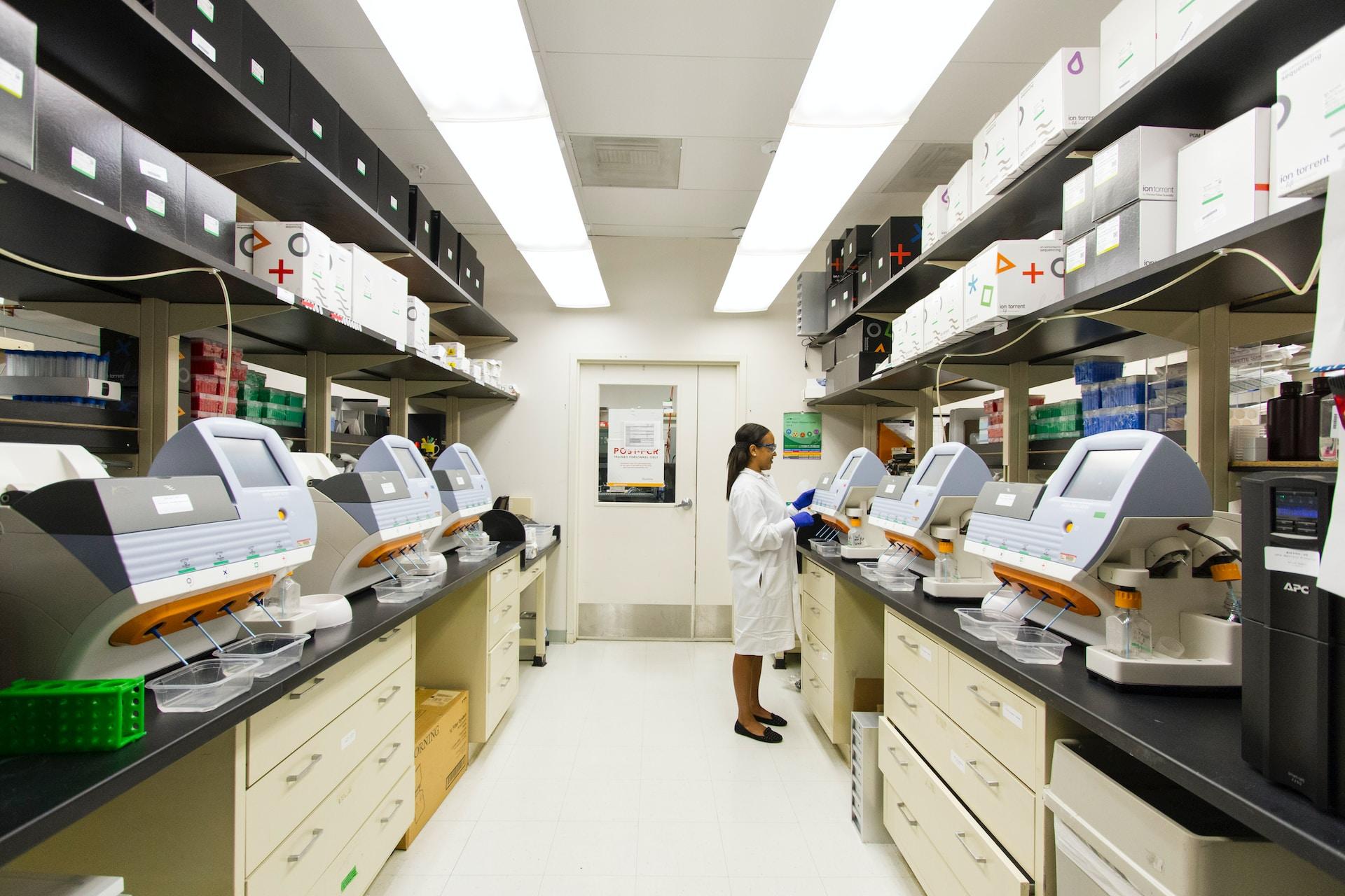 A chemistry lab with a scientist performing tasks.