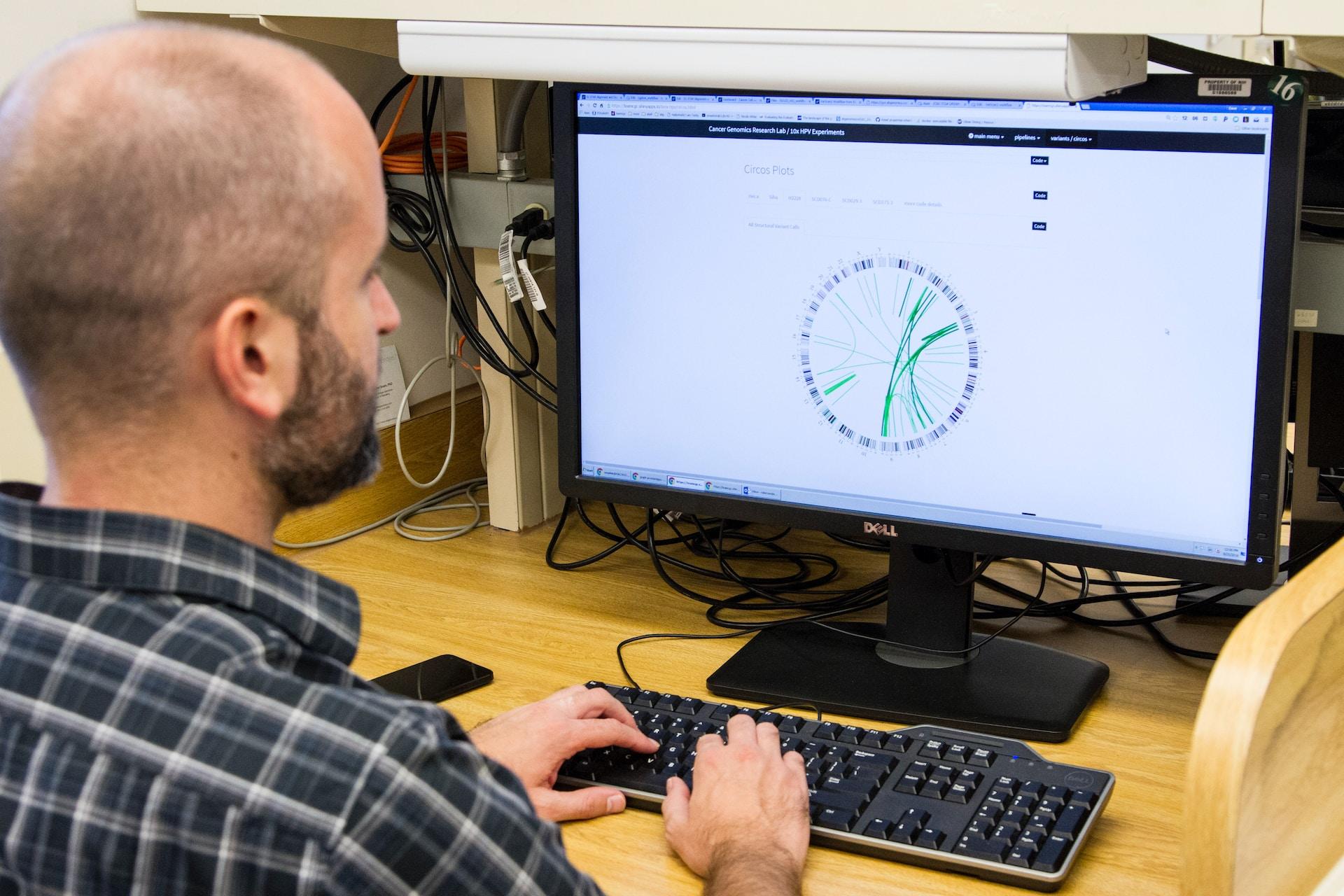 A scientist uses a software to identify a specimen.