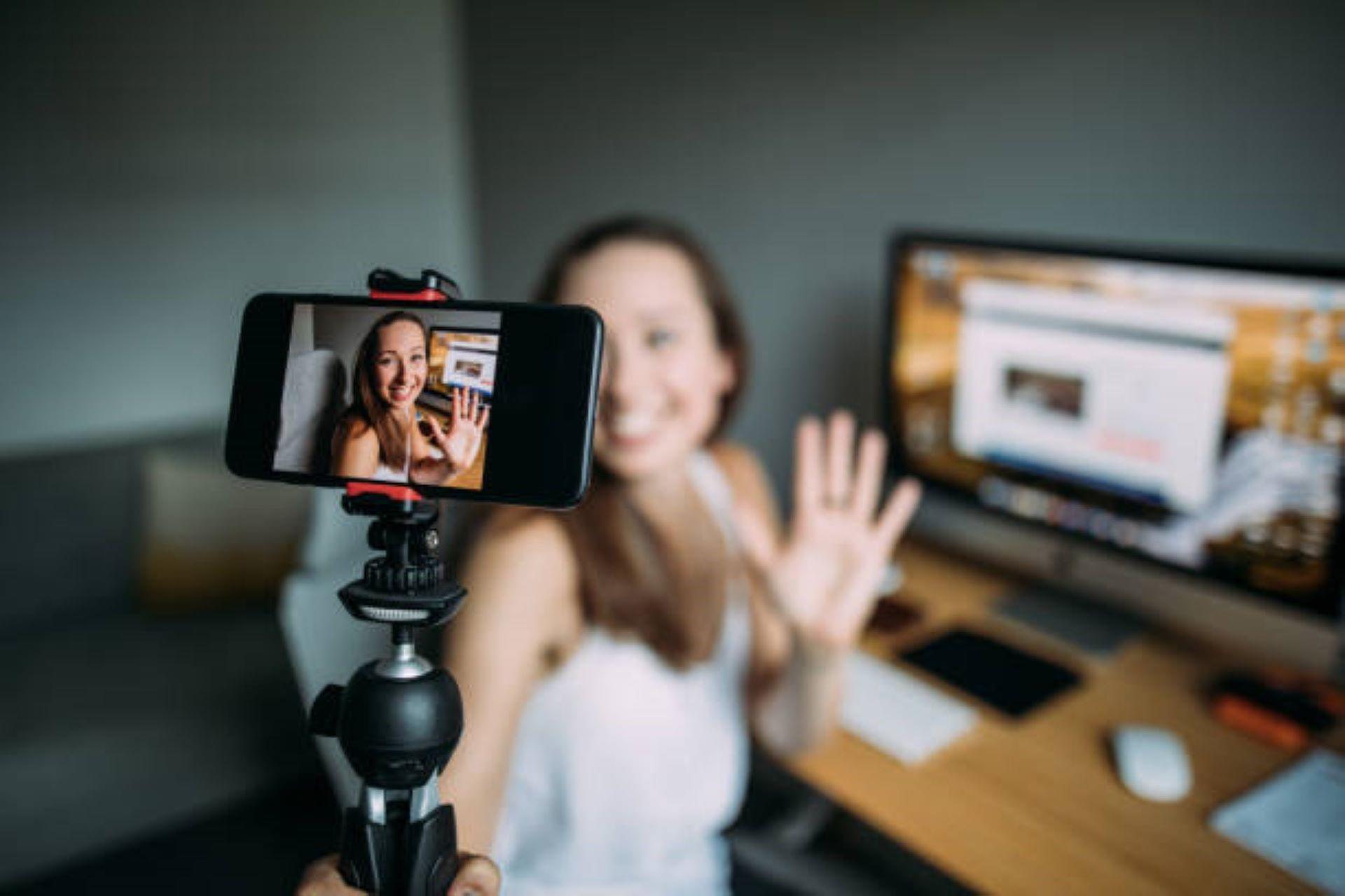 An influencer vlogging at home.