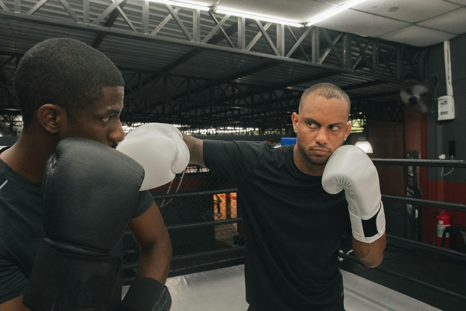 two boxing sparring partners practicing technical sparring