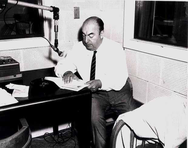 Pablo Neruda writing in his office.