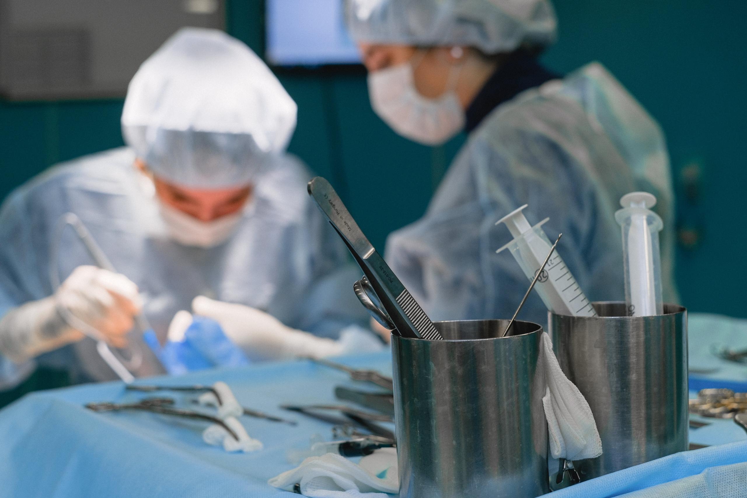 A nurse Helping out in surgery.