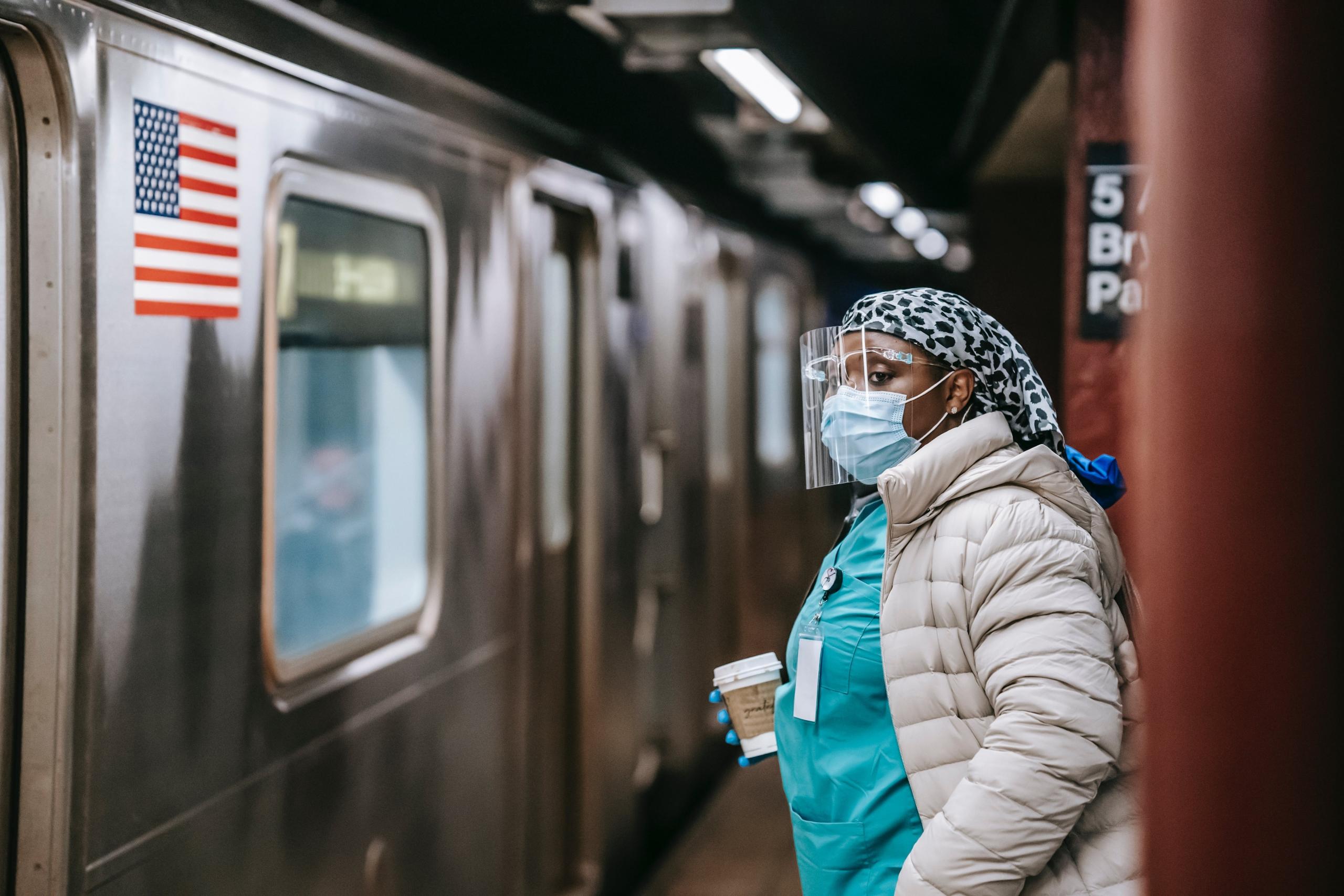 A nurse taking the train