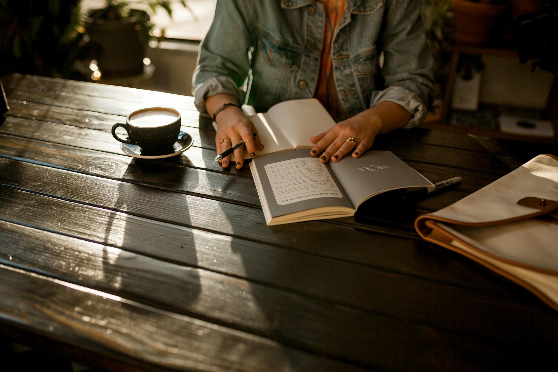 A person reading and writing.