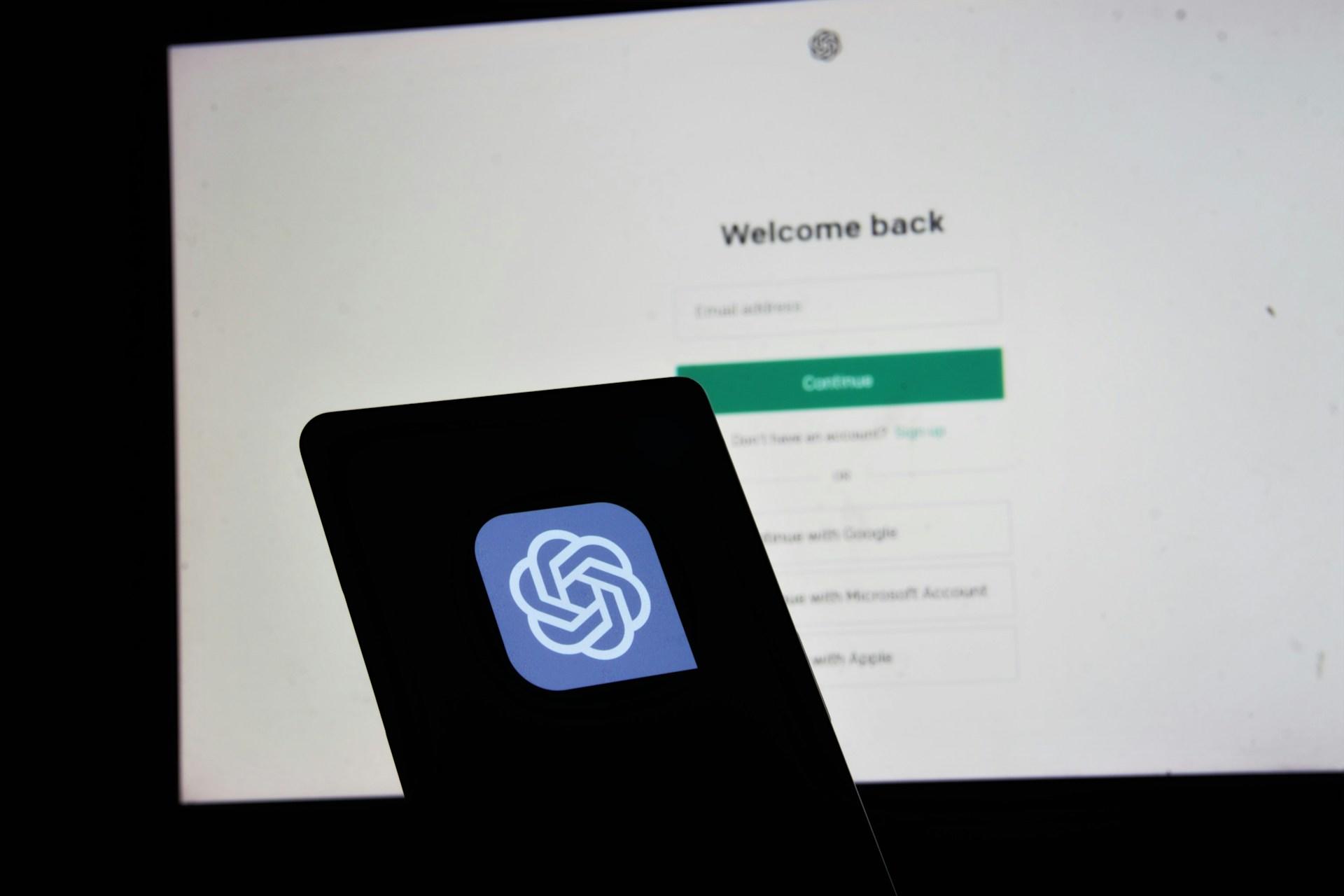 OpenAI on a laptop and smartphone.