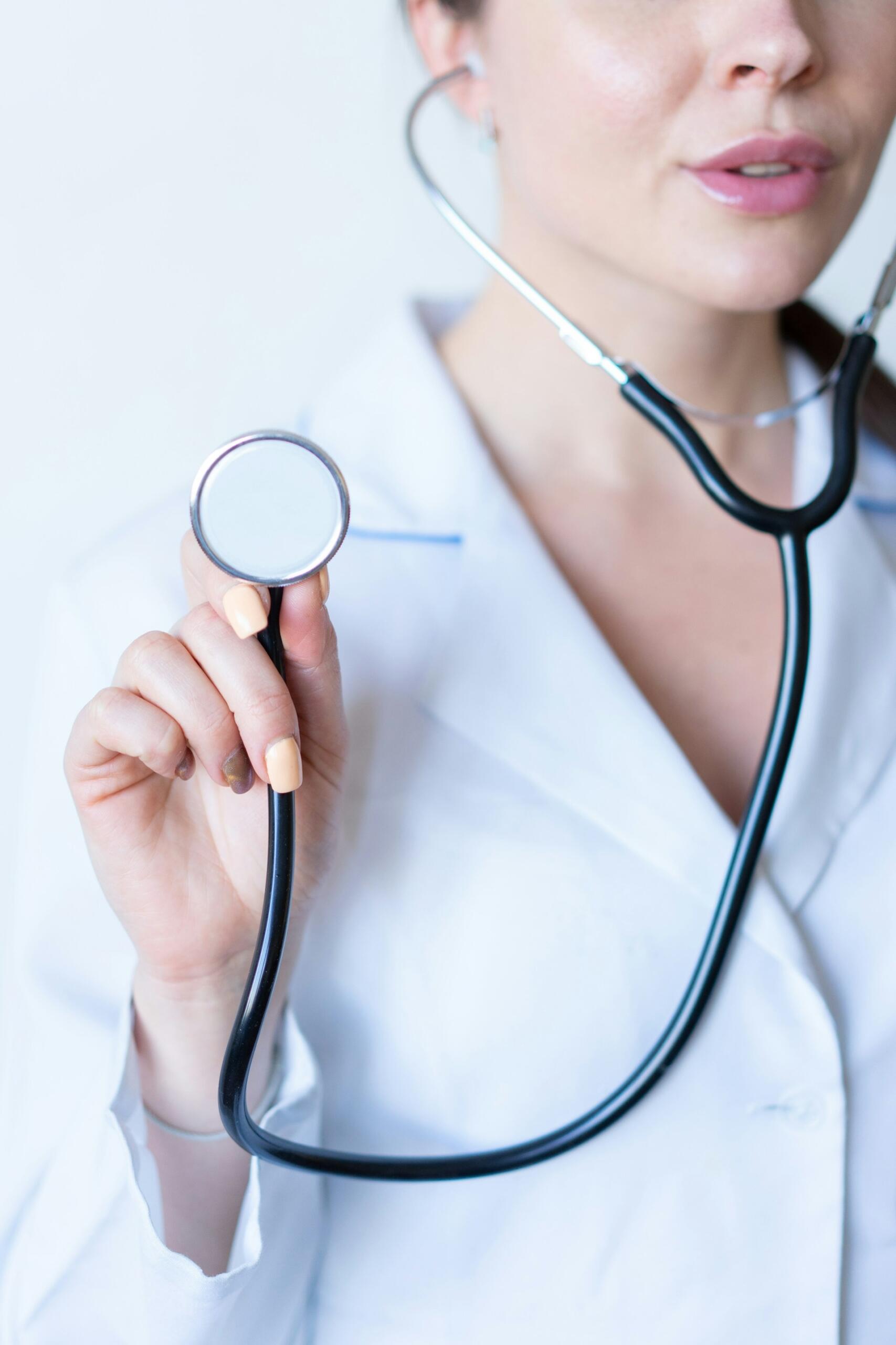 A doctor holding a stethoscope.