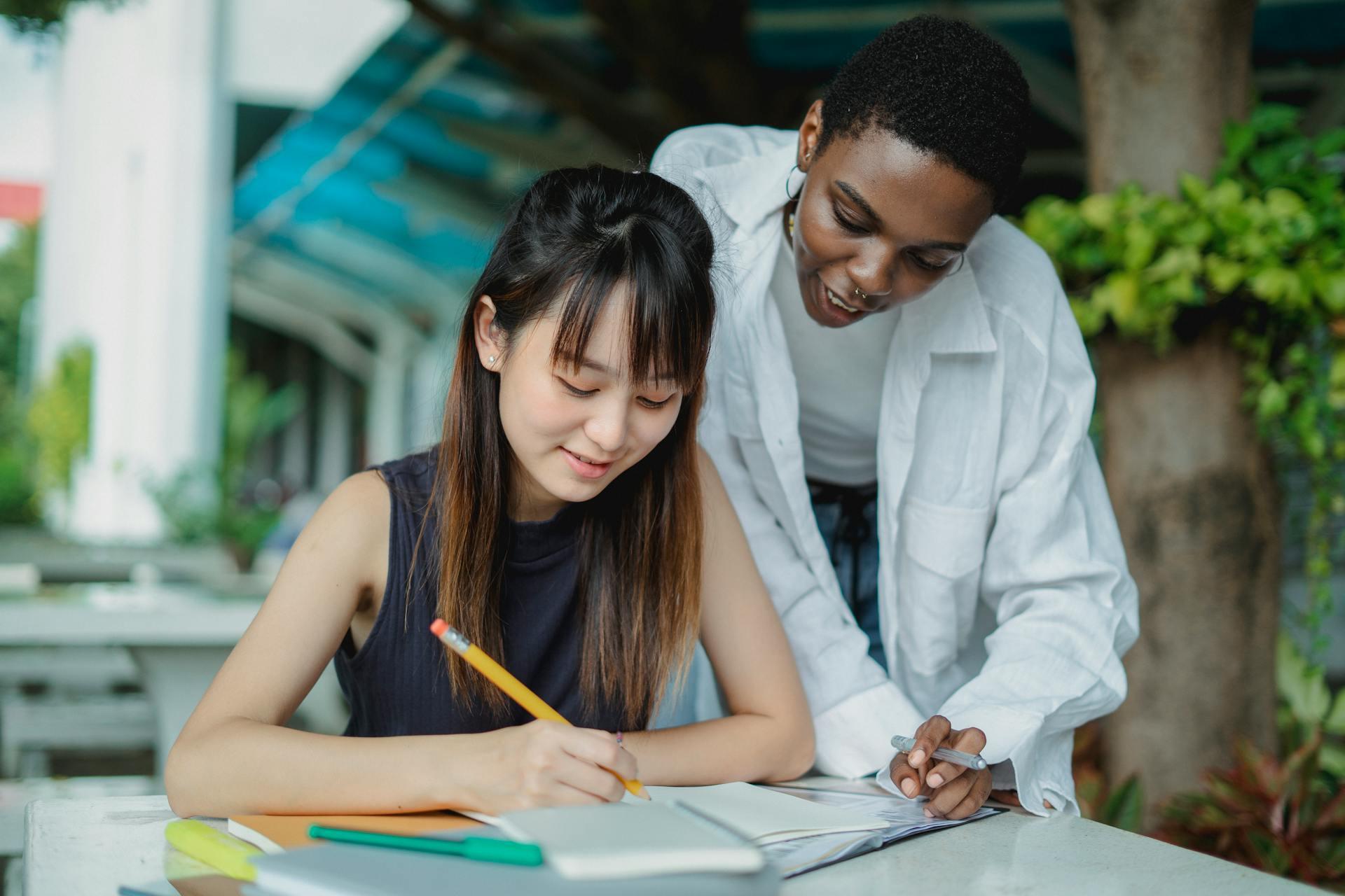 A tutor helping a student with their homework.