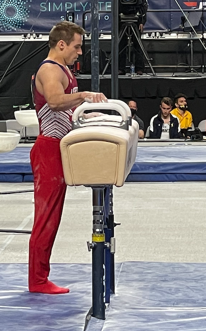 A gymnast starting his Pommel Horse routin.