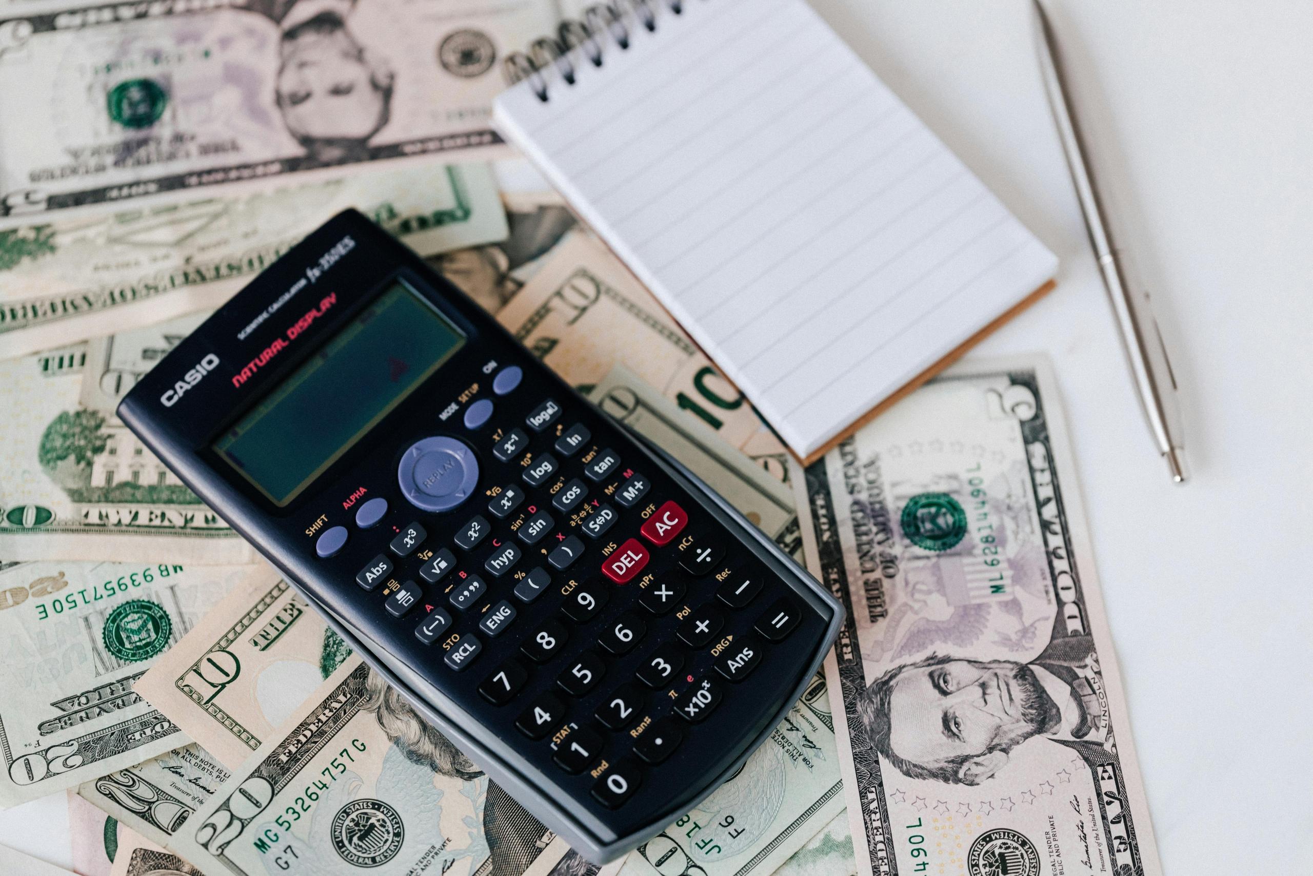 A calculator on money.