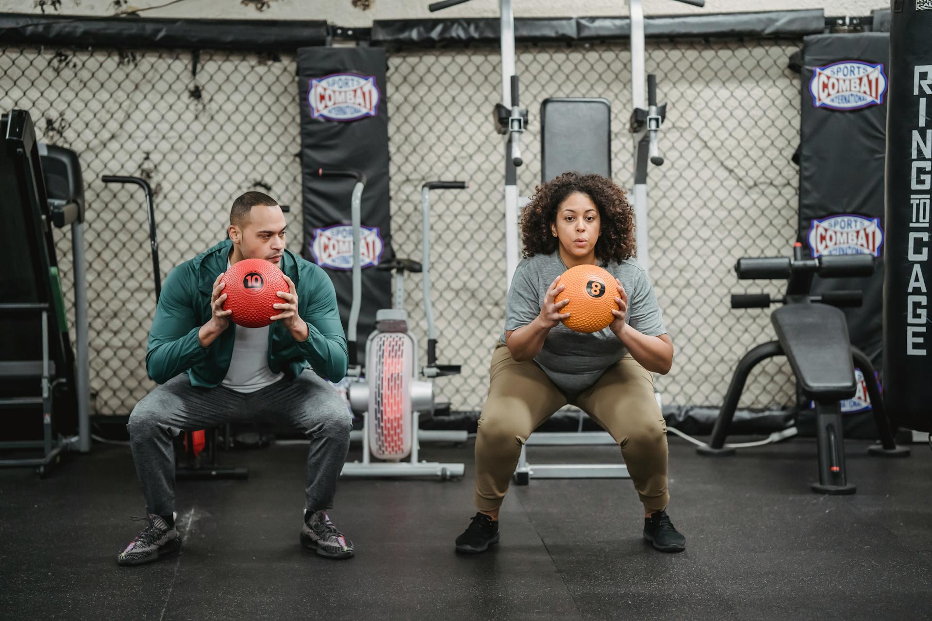 A trainer and their client working out