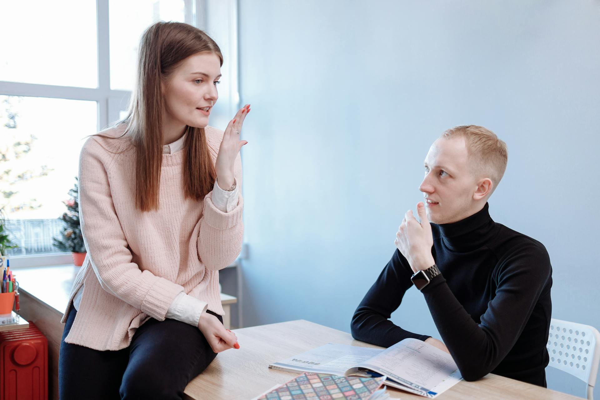 A man and women during a tutoring session.