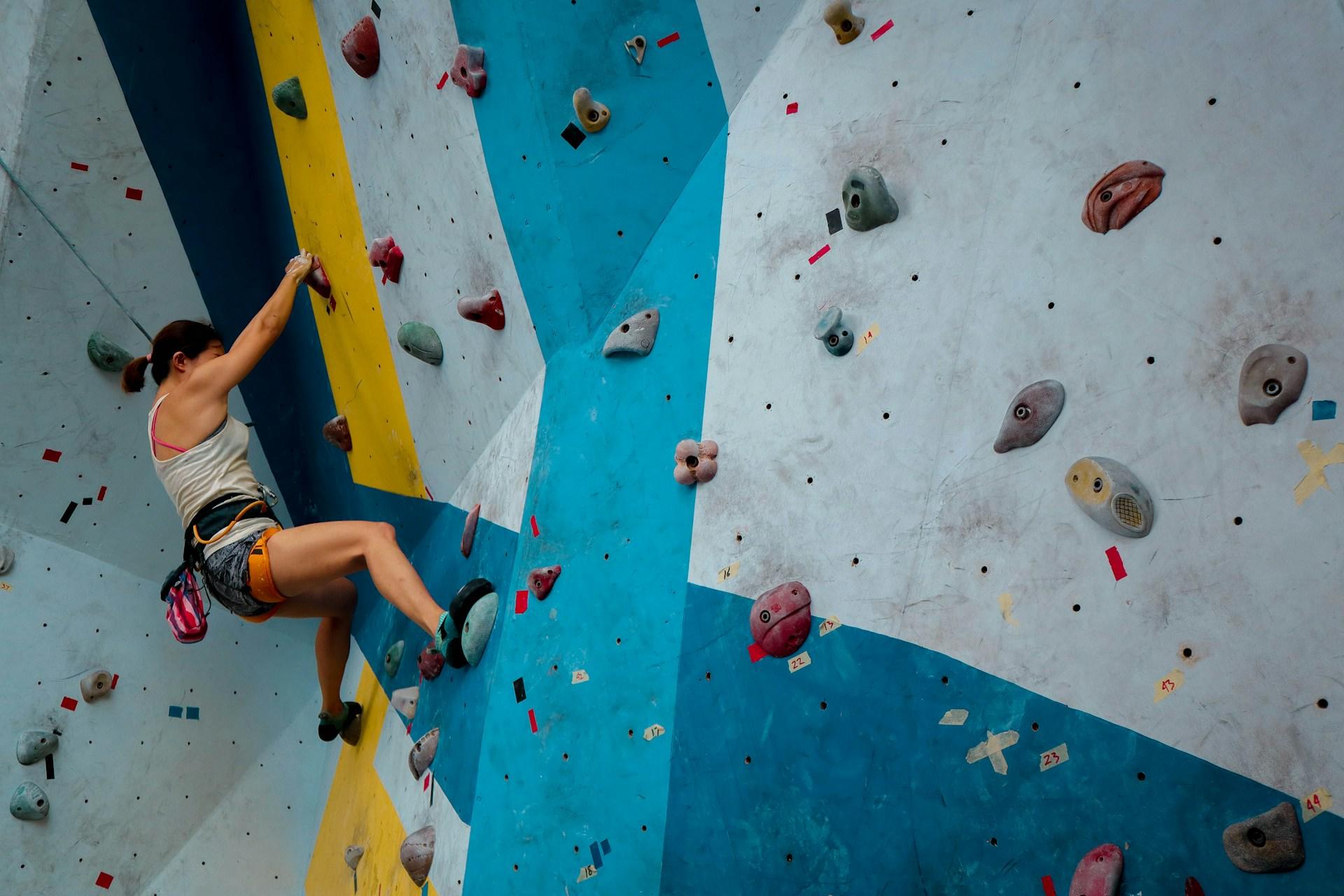 A person rock climbing. Source: Rahadiansyah 