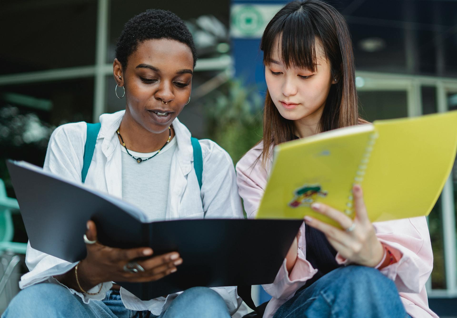 Two students learning German grammar rules.