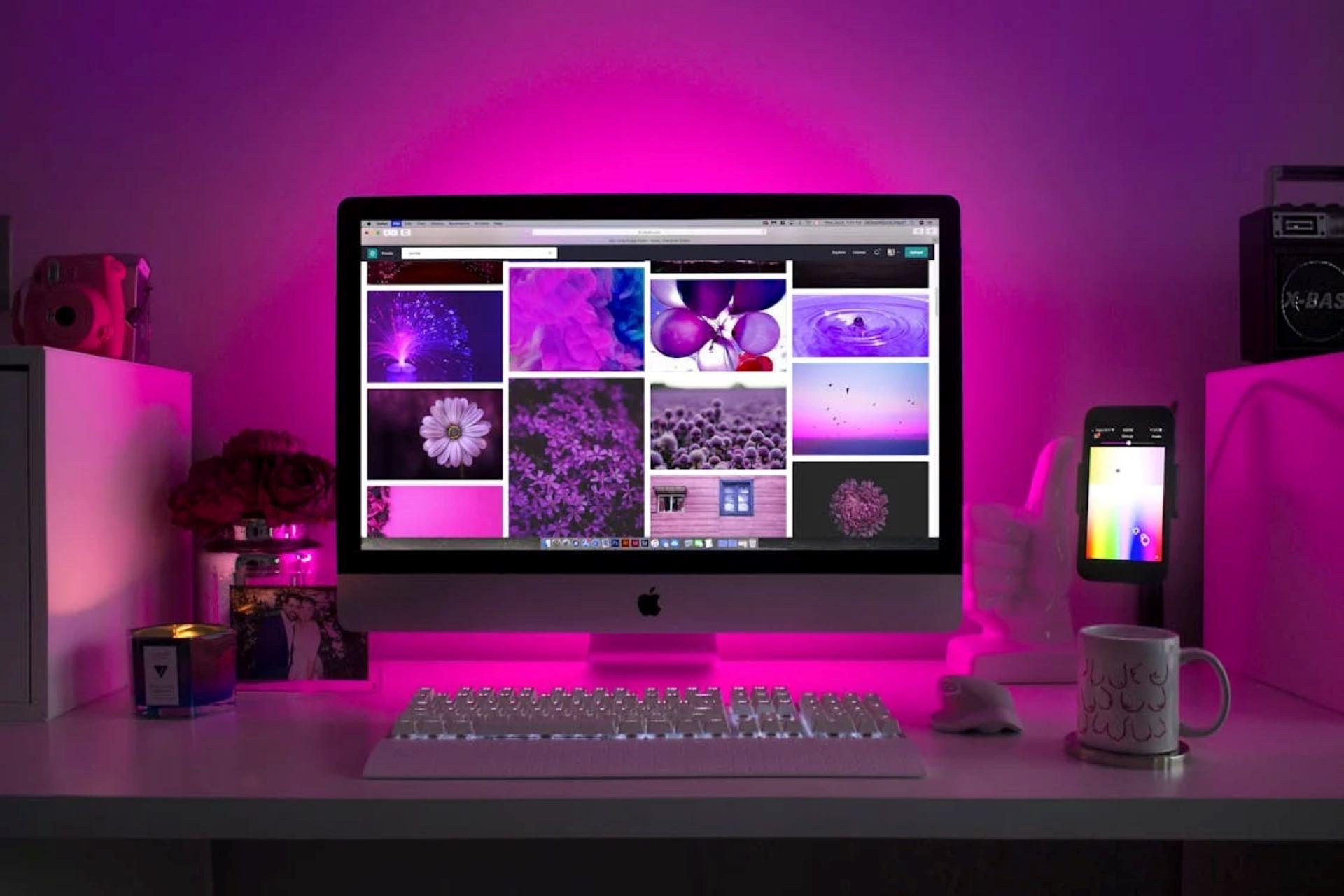 A computer displaying a collage of graphic design elements.