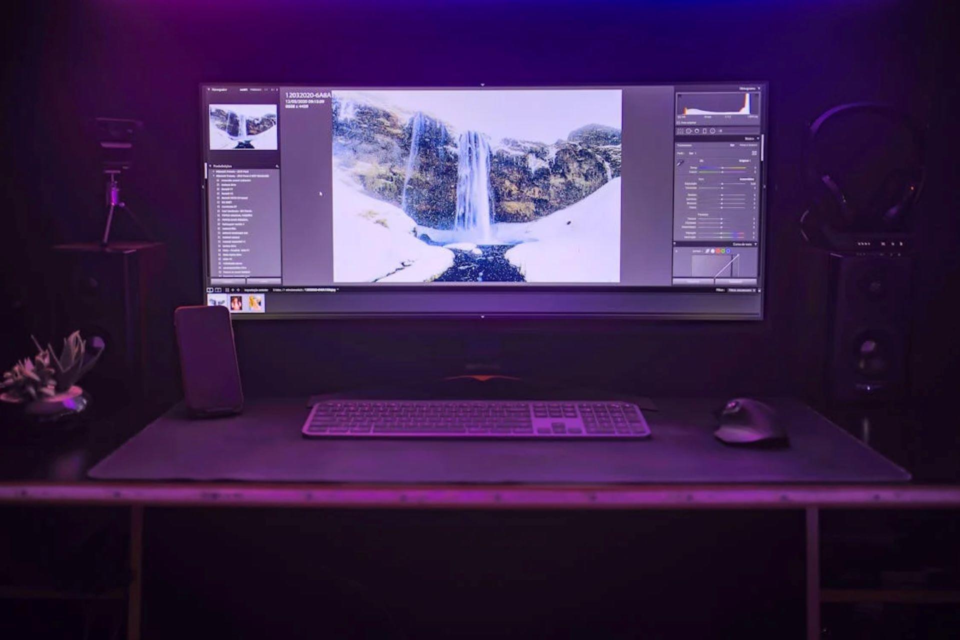 Desktop computer setup with monitor, keyboard, and mouse.