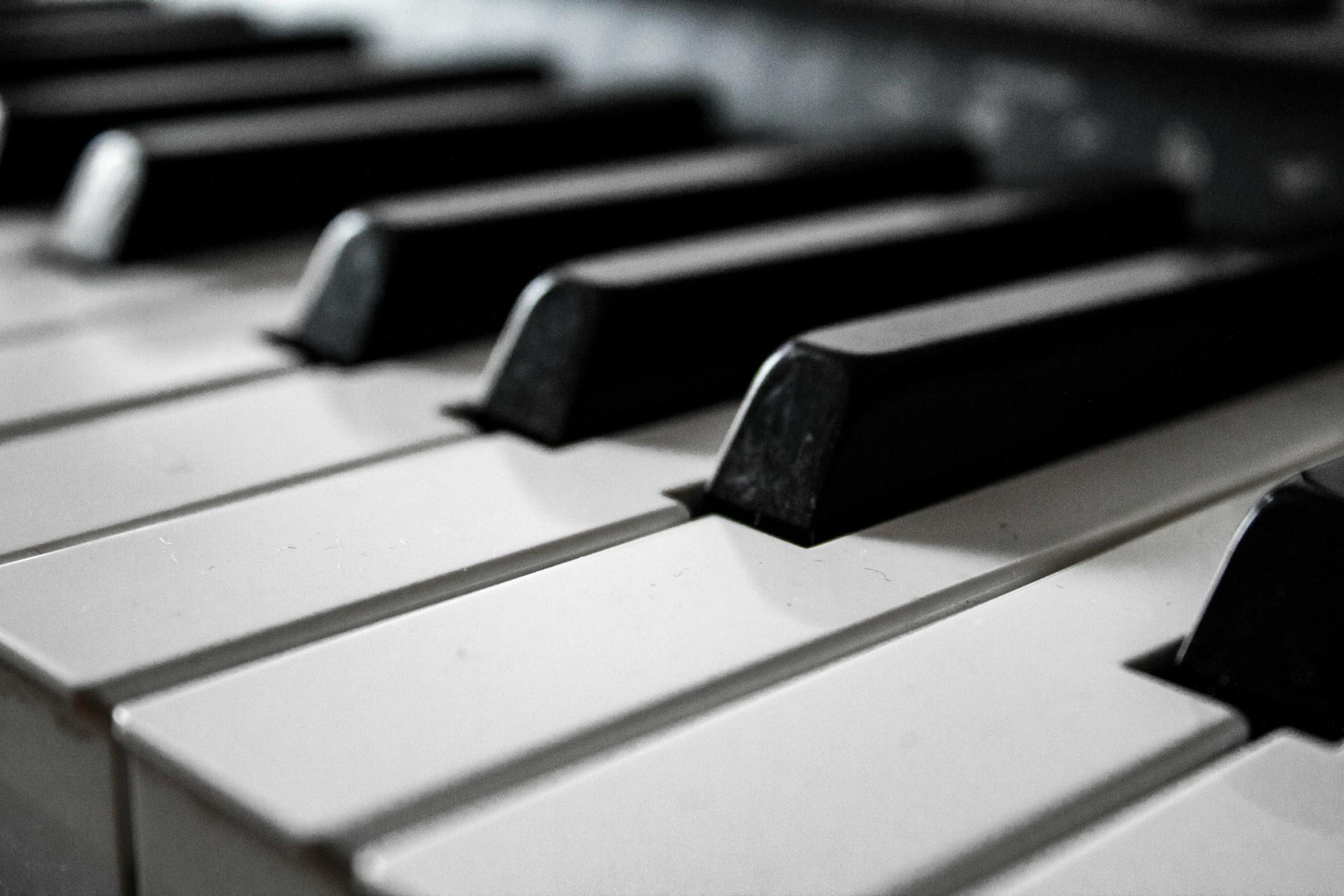 A closeup photo of a piano's keyboard.