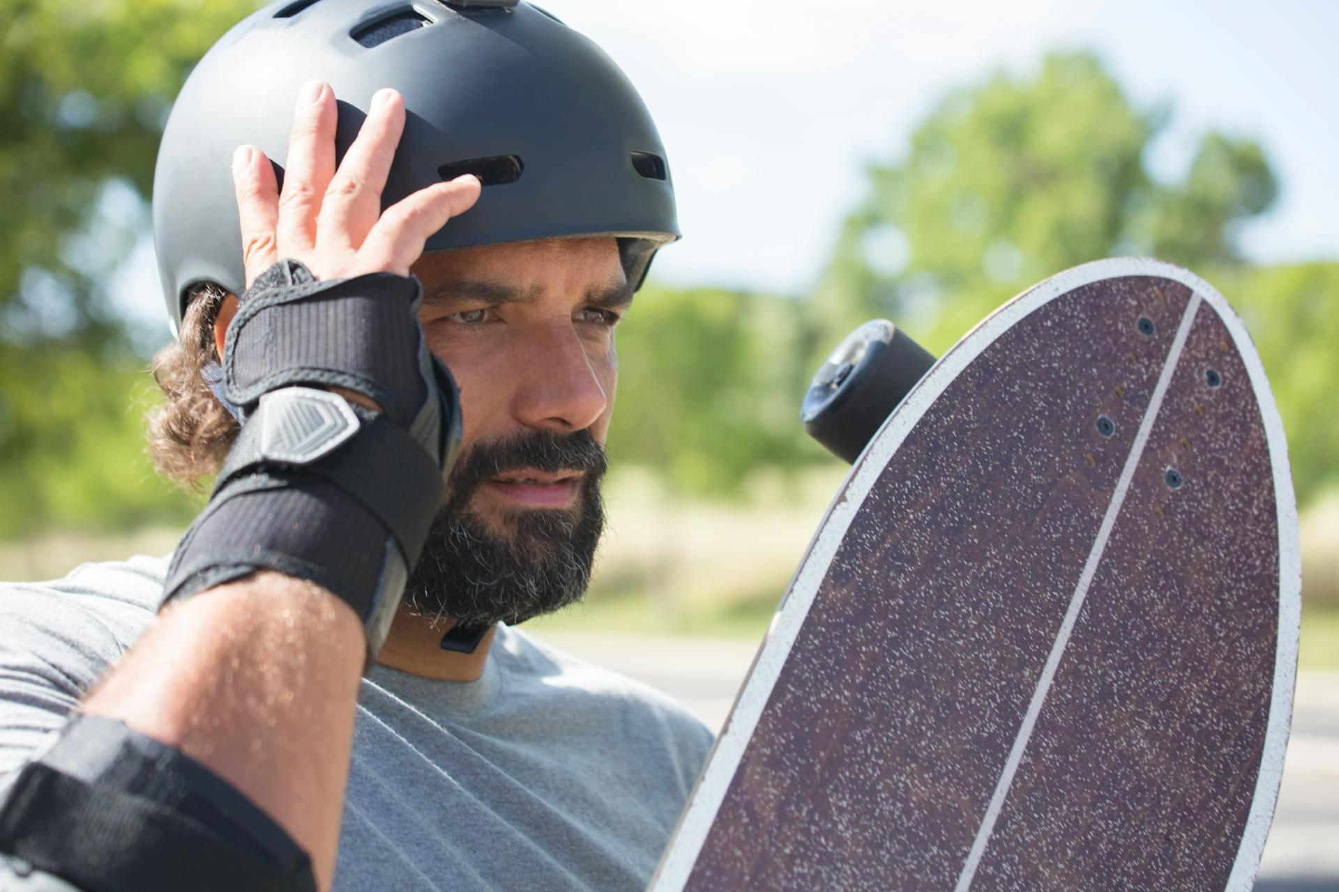 A man wearing a skateboard helmet