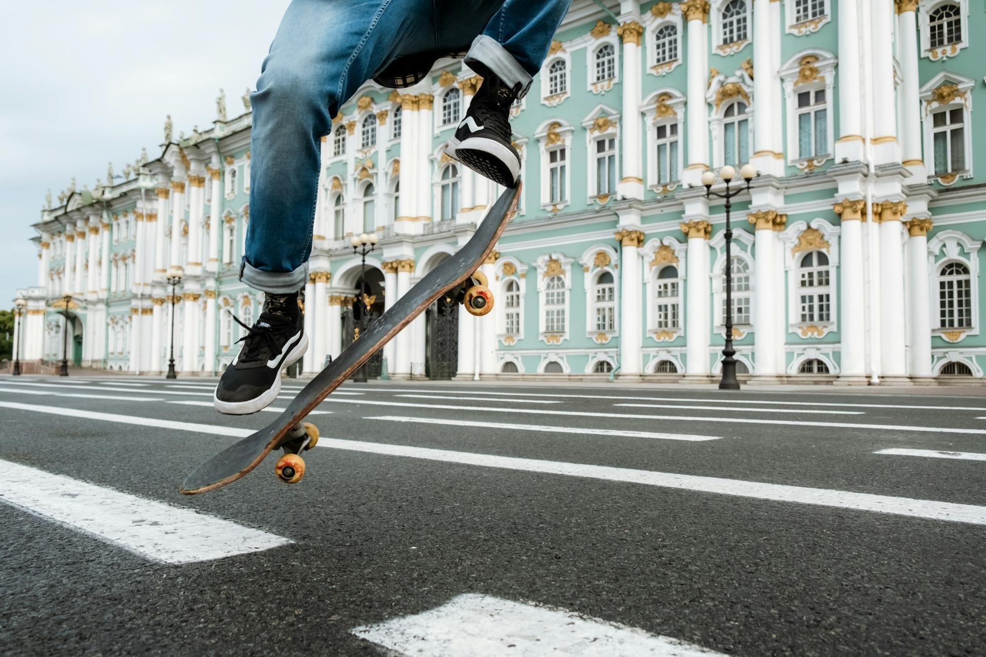 A skateboarder performing an Ollie jump trick