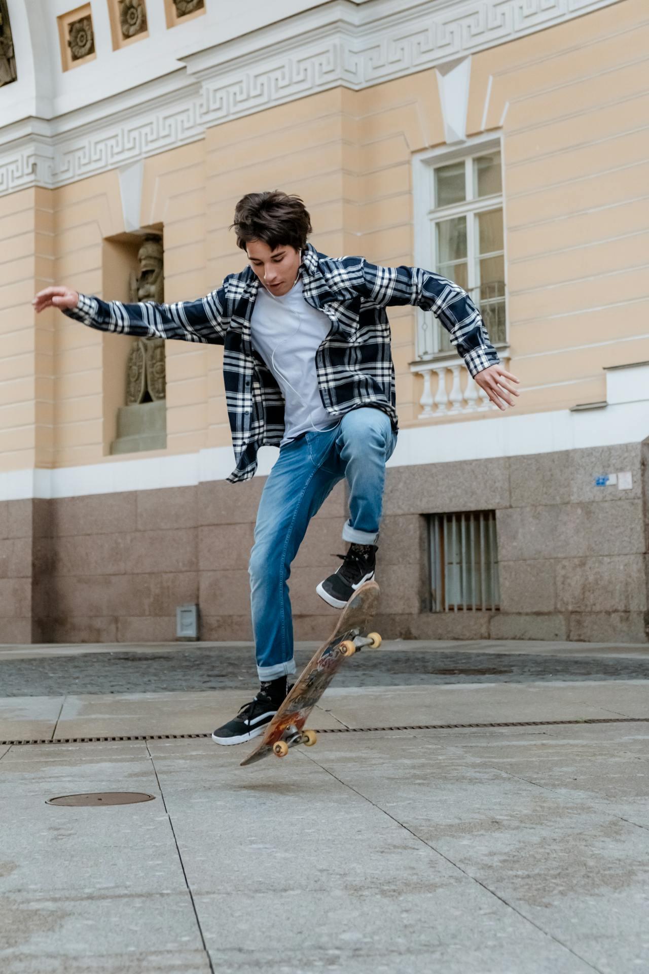 A skater practicing ollies on their skateboard