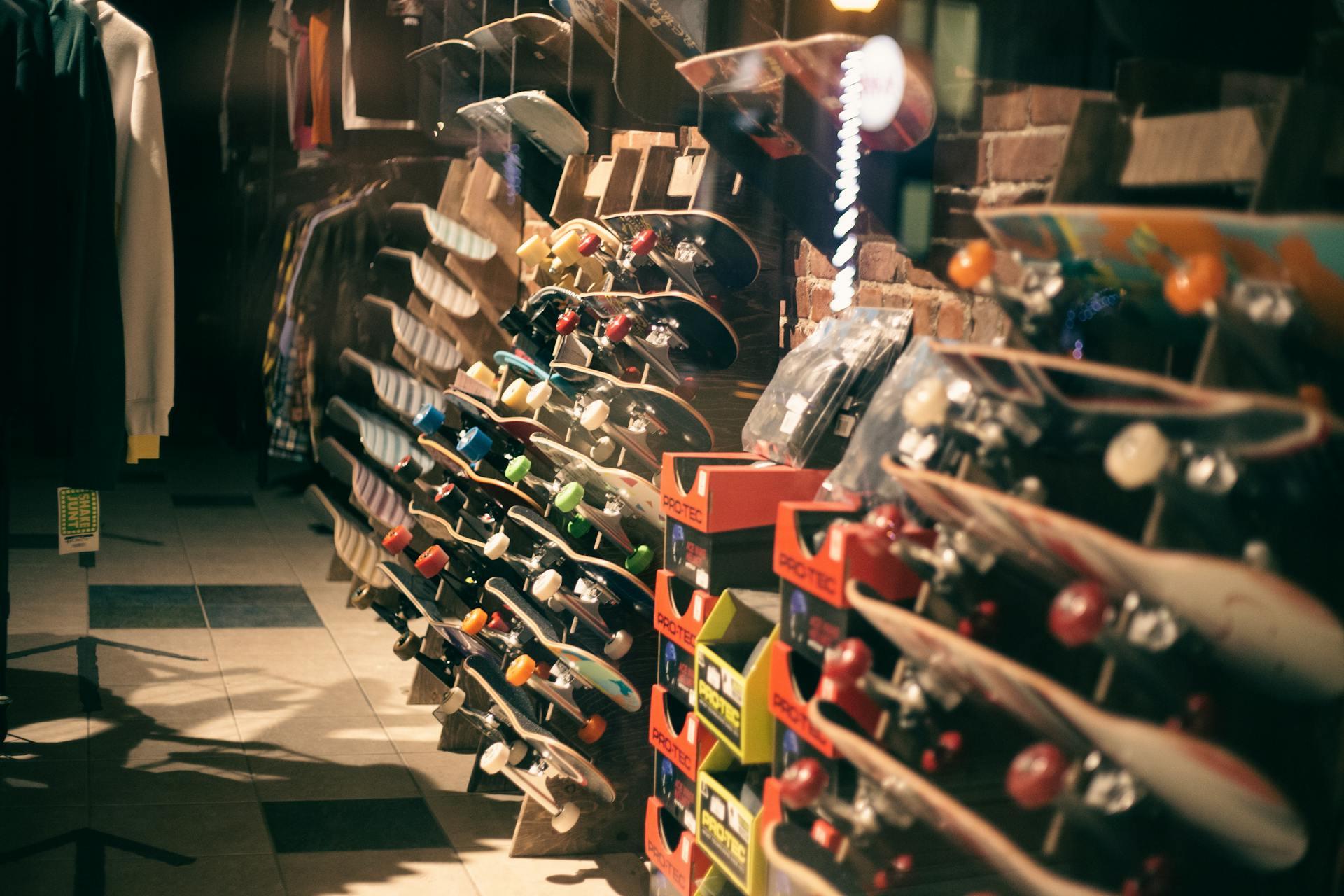 Dozens of skateboards on display in a skate shop