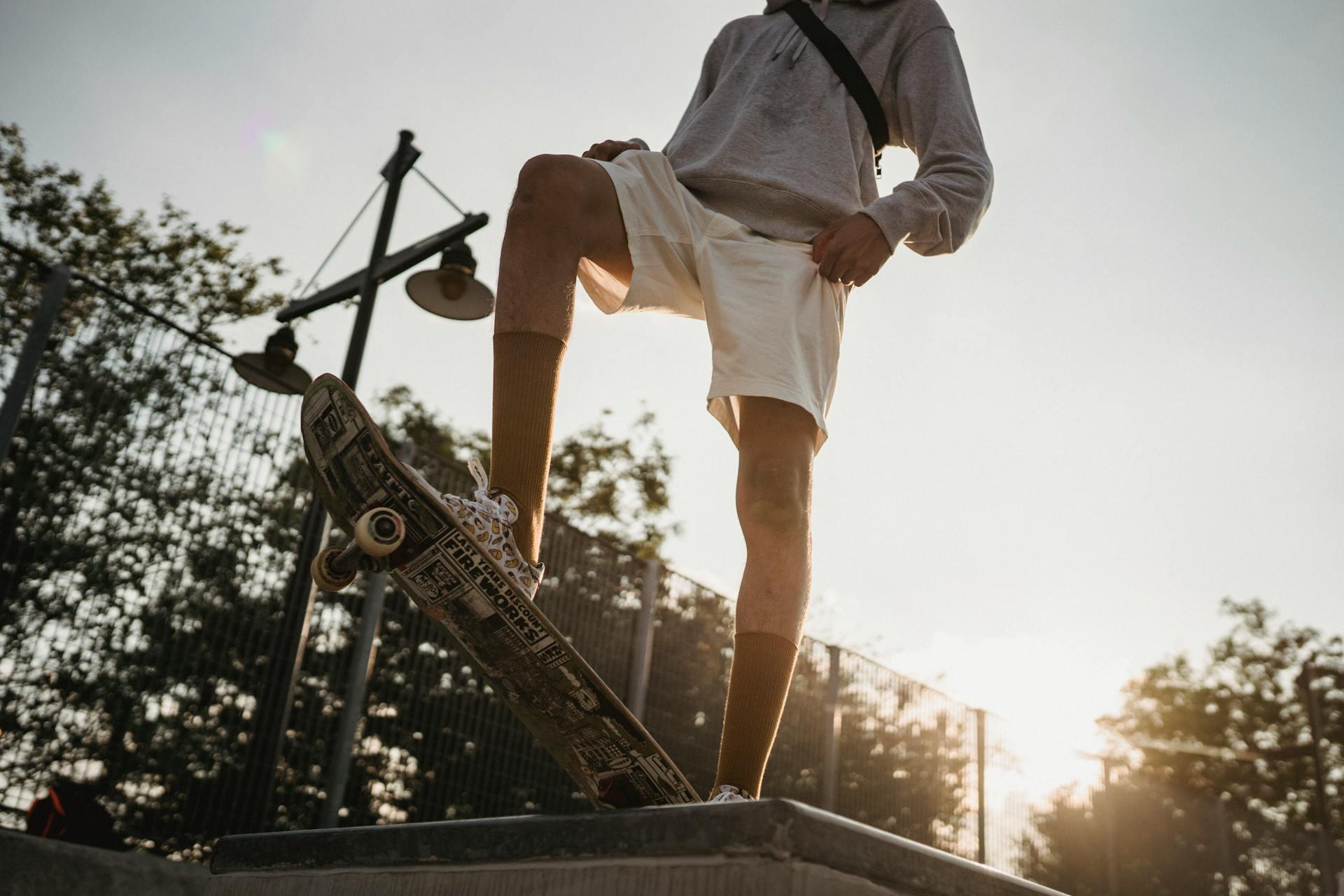 A skateboarder prepares to go down a ramp