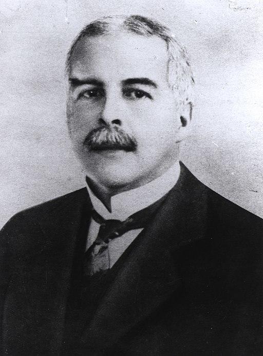 A black and white portrait of Gilbert Newton.