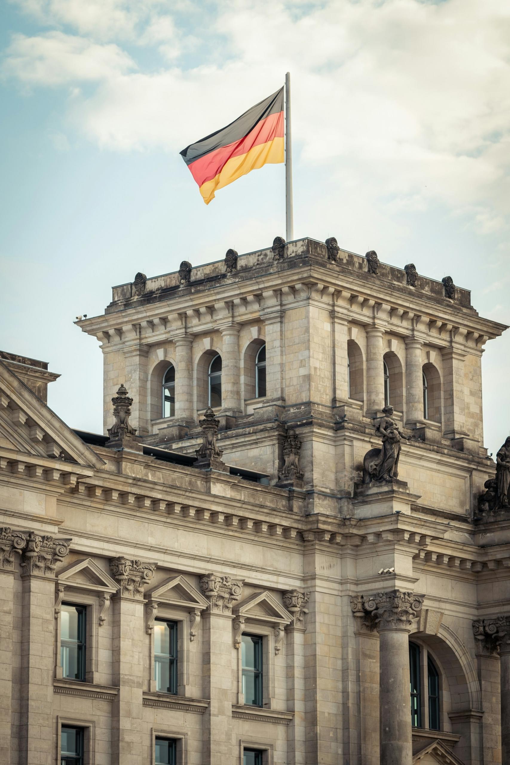 A building in Germany with the German flag on top
