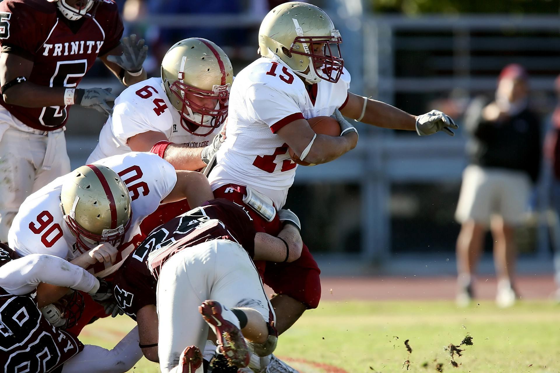 college football players playing an intense game