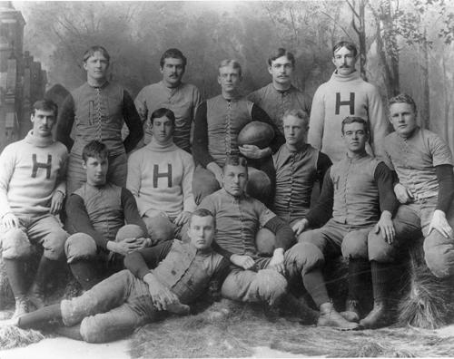 A black and white photo of the Harvard football team in 1890