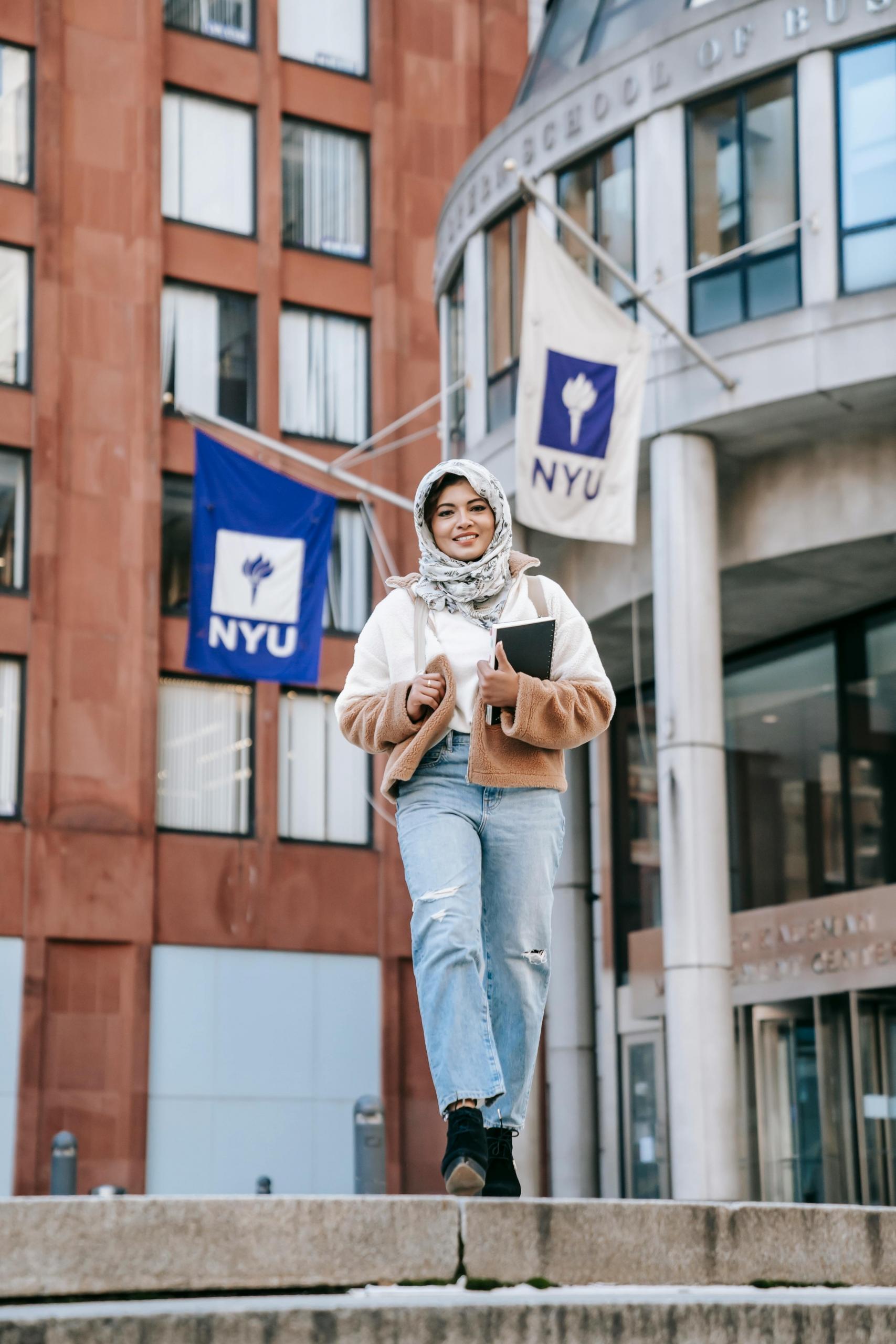 A student confidently walking the college grounds after earning her place to study finance at New York University