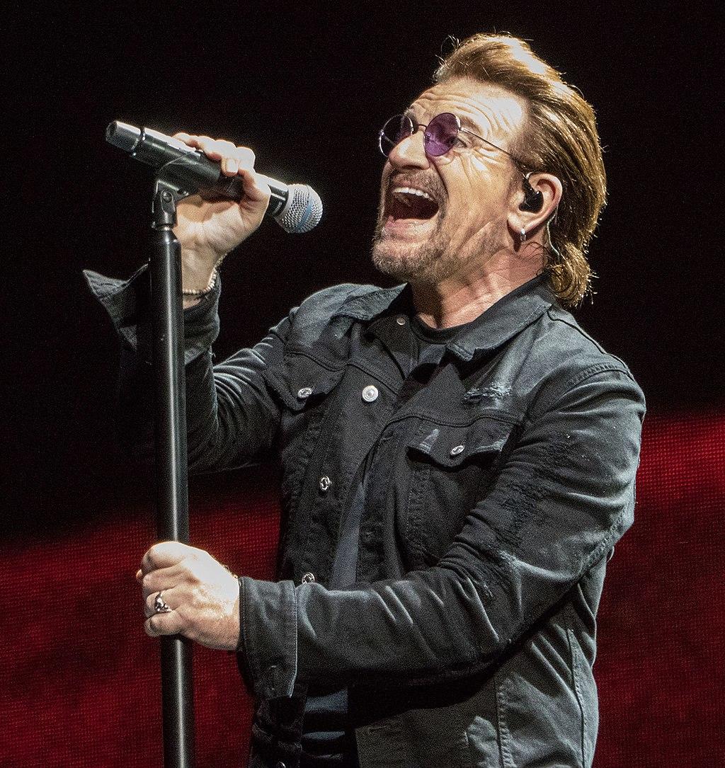 Bono singing on stage