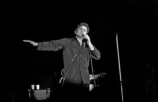 Johnny Cash performing on stage in 1972.