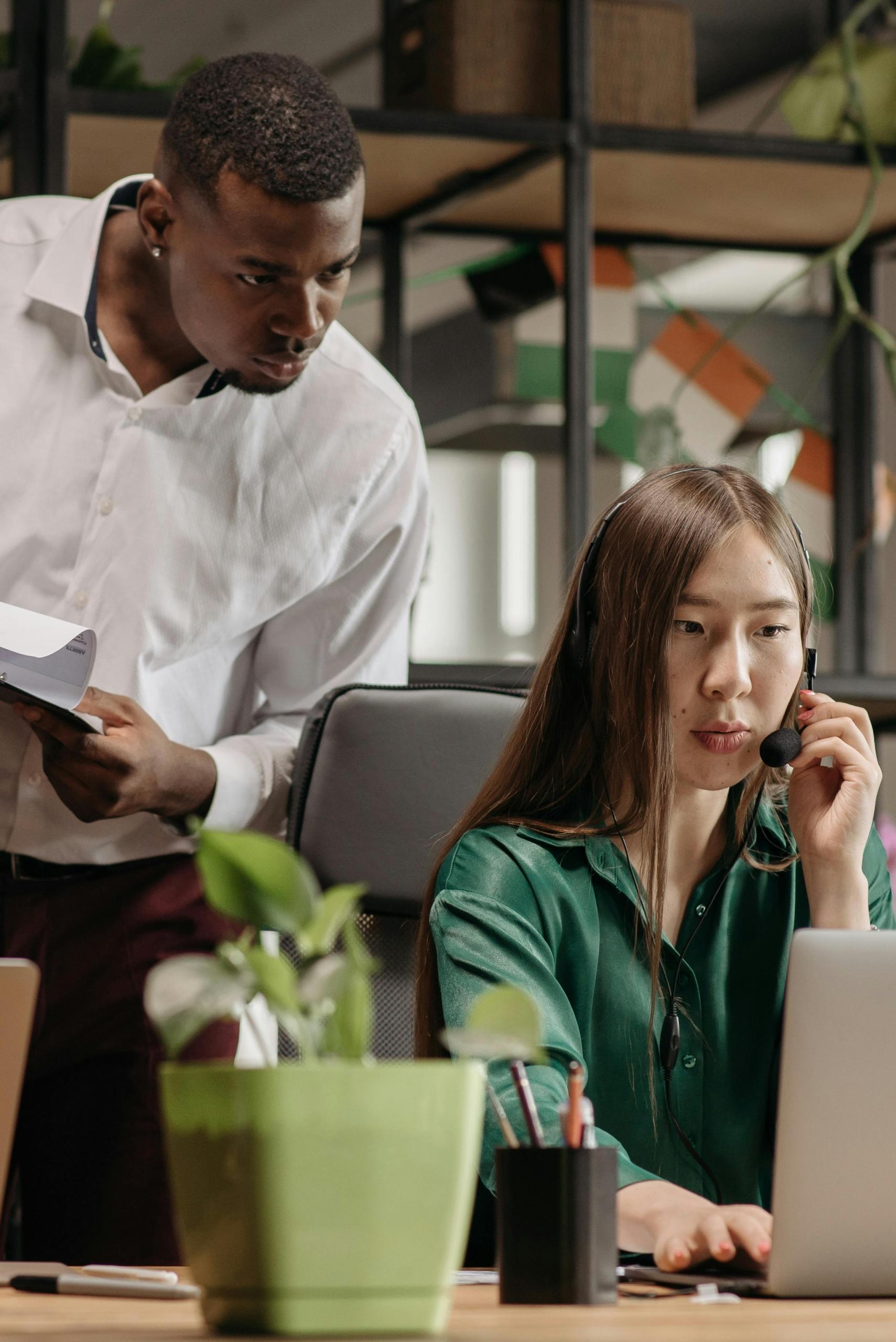 An AutoCAD instructor helping the office learn how to use various tool