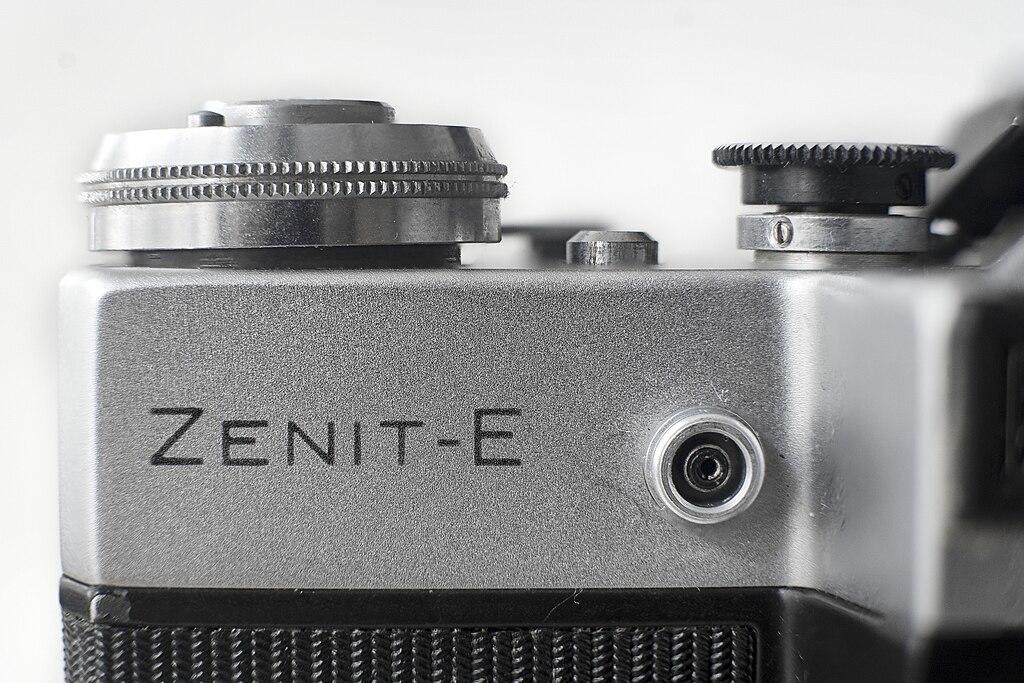 Zenit-E camera top view on white background.
