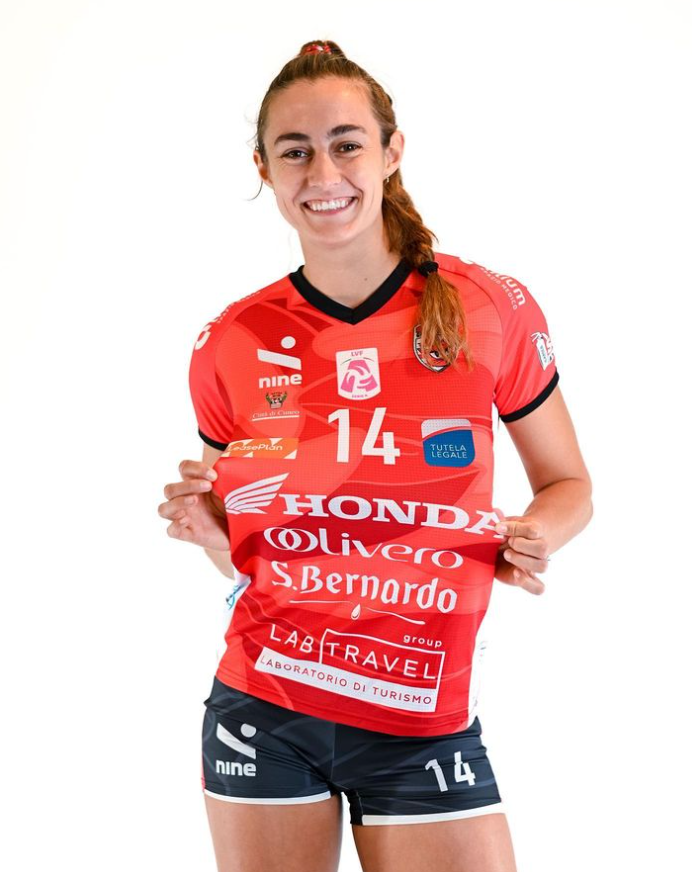 Anna Hall wearing a red jersey