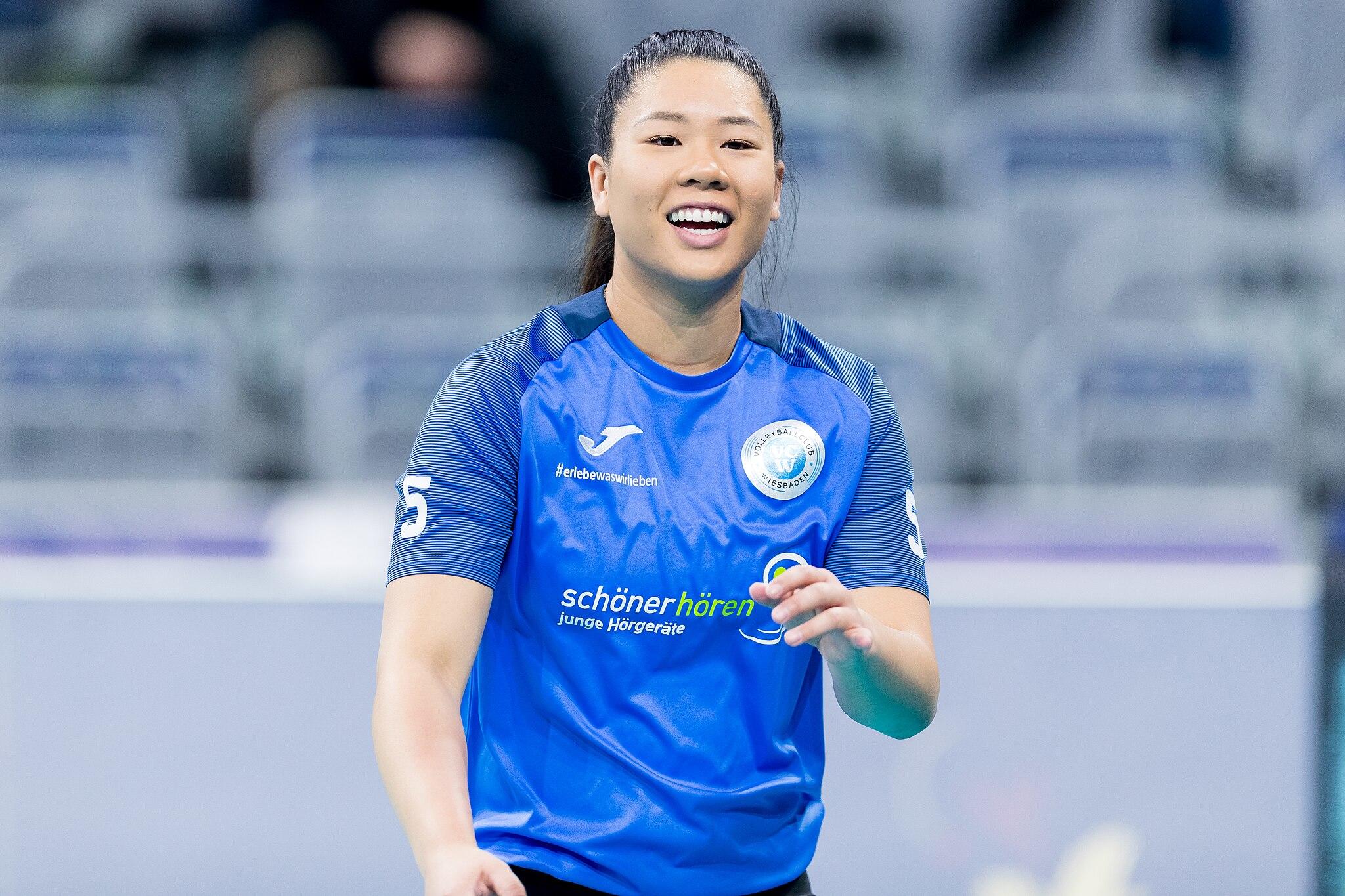 Justine Wong-Orantes wearing a blue jersey