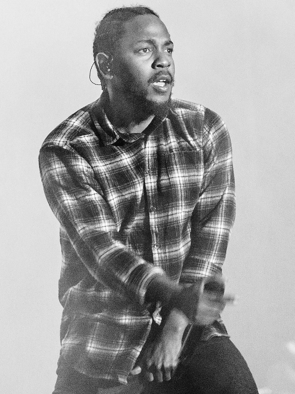 A black and white photo of Kendrick Lamar