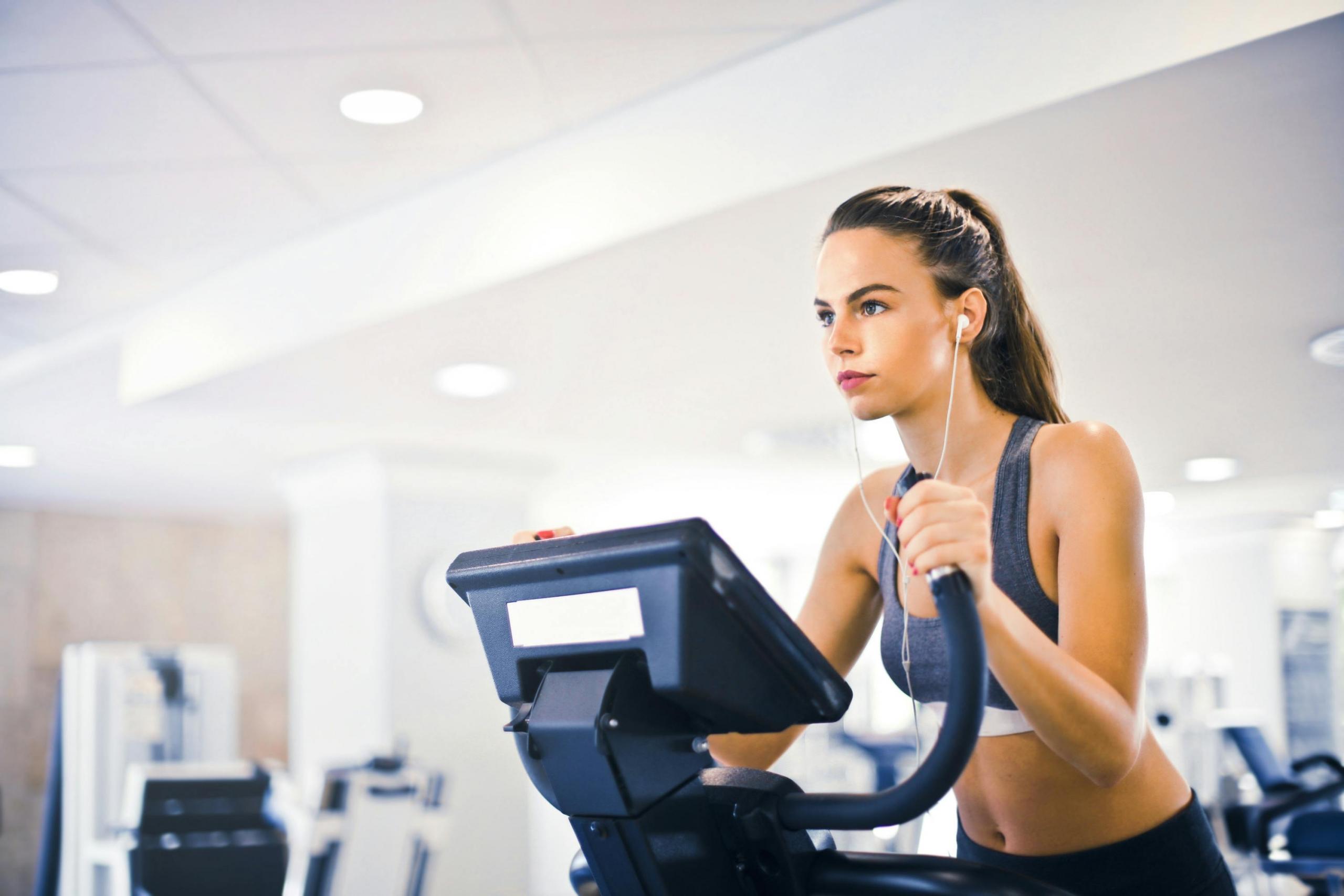 A woman working hard at her favorite NYC gym