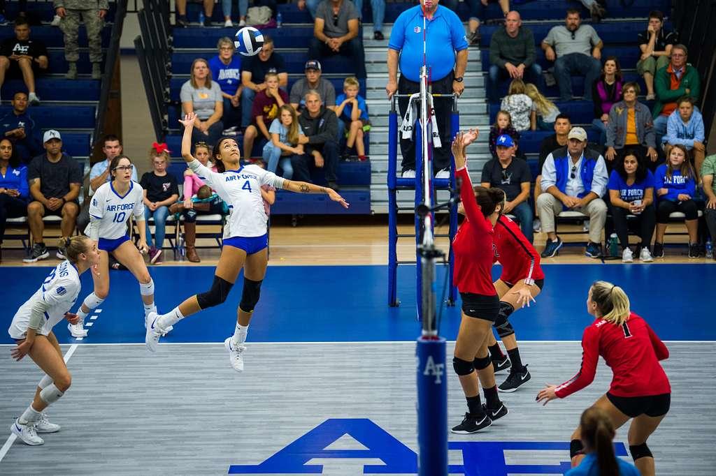 Air Force volleyball team playing against a red team.