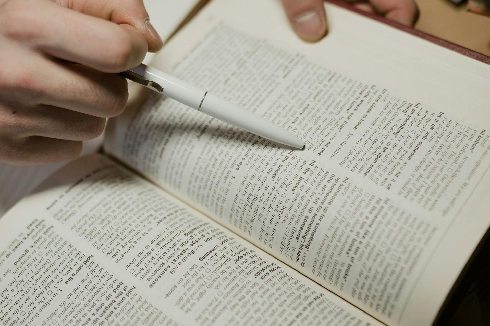 Reading a book in English, studying the language