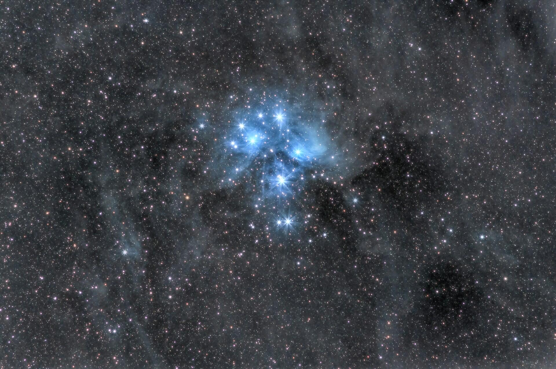 9h exposure of the Pleiades star cluster.