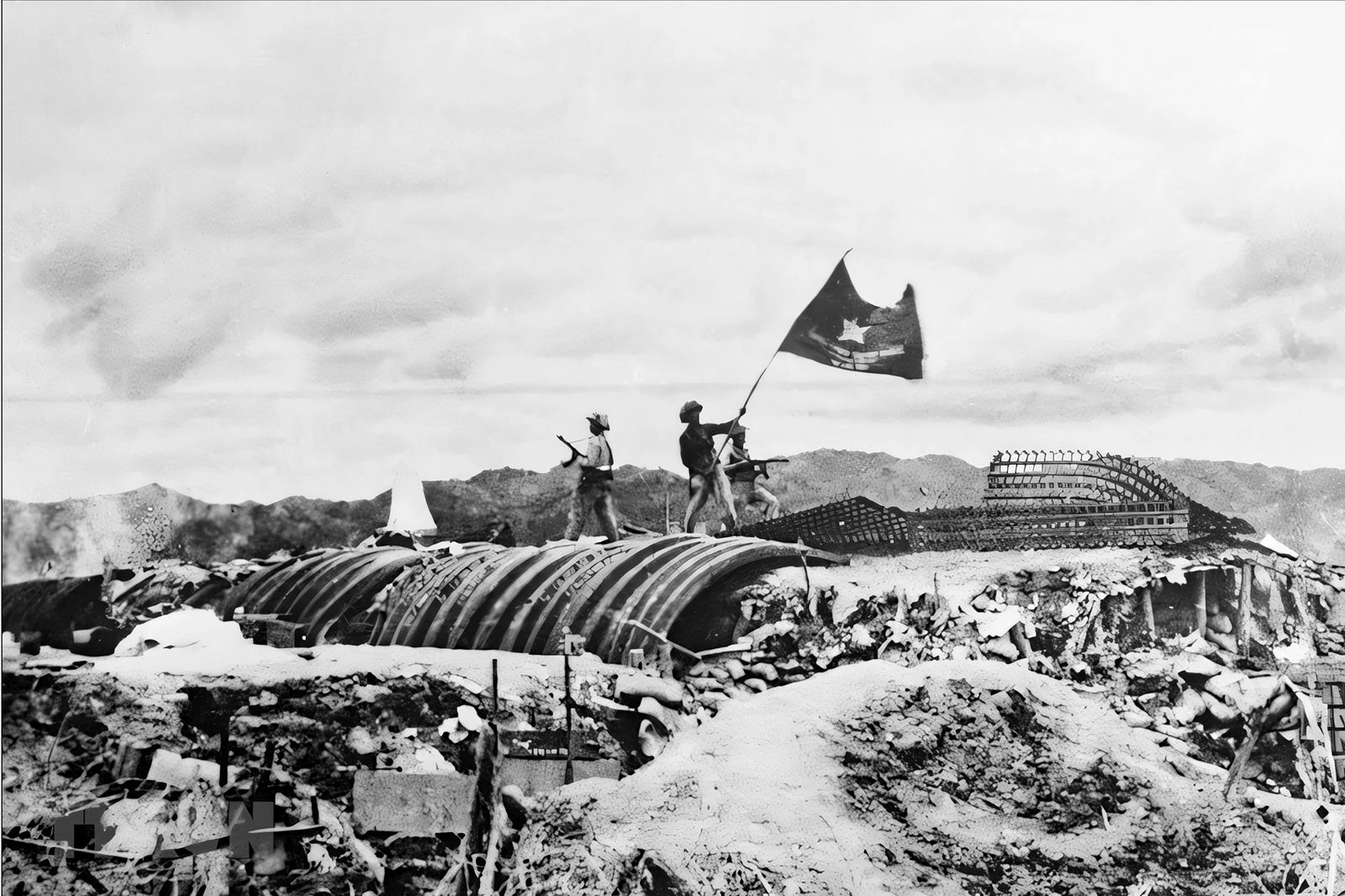 A black and white image of the Vietnam victory of the Battle of Dien Bien Phu.